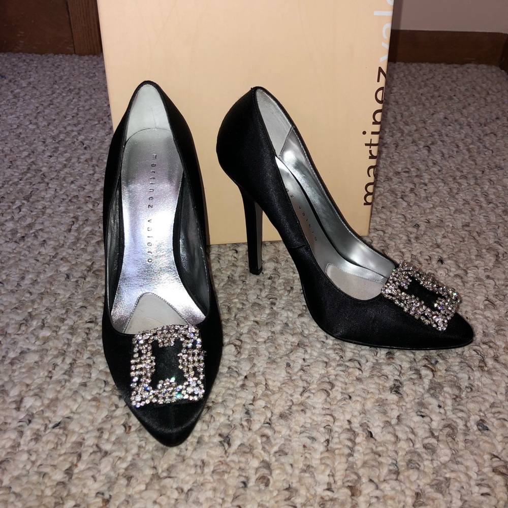 Martinez Valero black satin pumps.